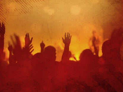 Worship Group Hands Orange Filtered