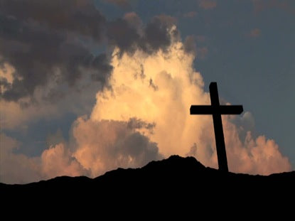 Billowing Clouds And A Cross