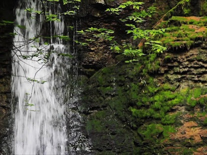 Waterfall And Rock Wall