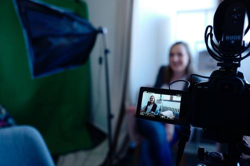 woman in front of camera